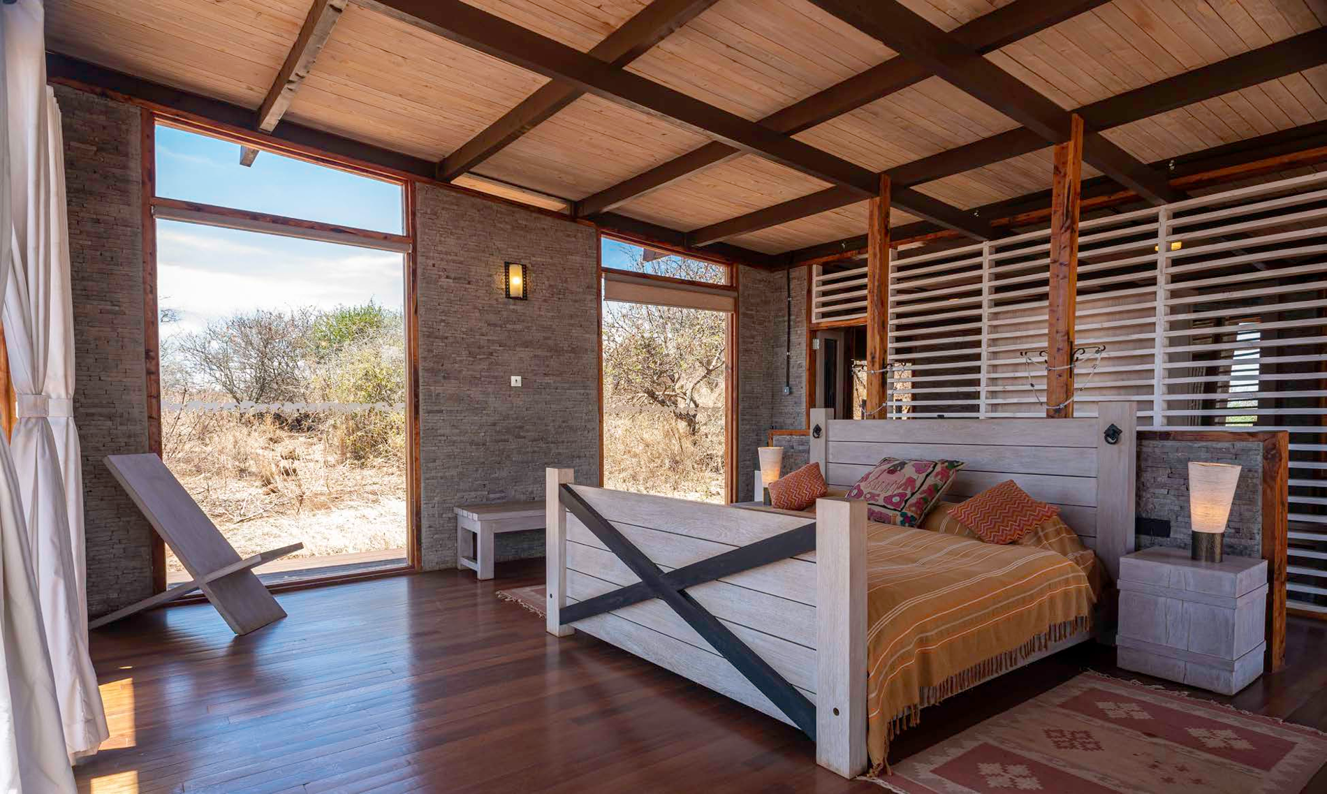 Bedroom with a timber ceiling and expansive views