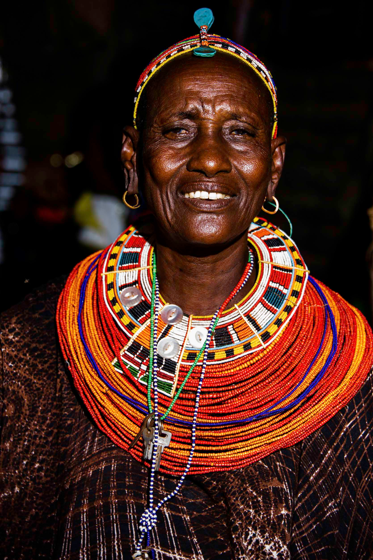 Portrait with colourful layered traditional beadwork
