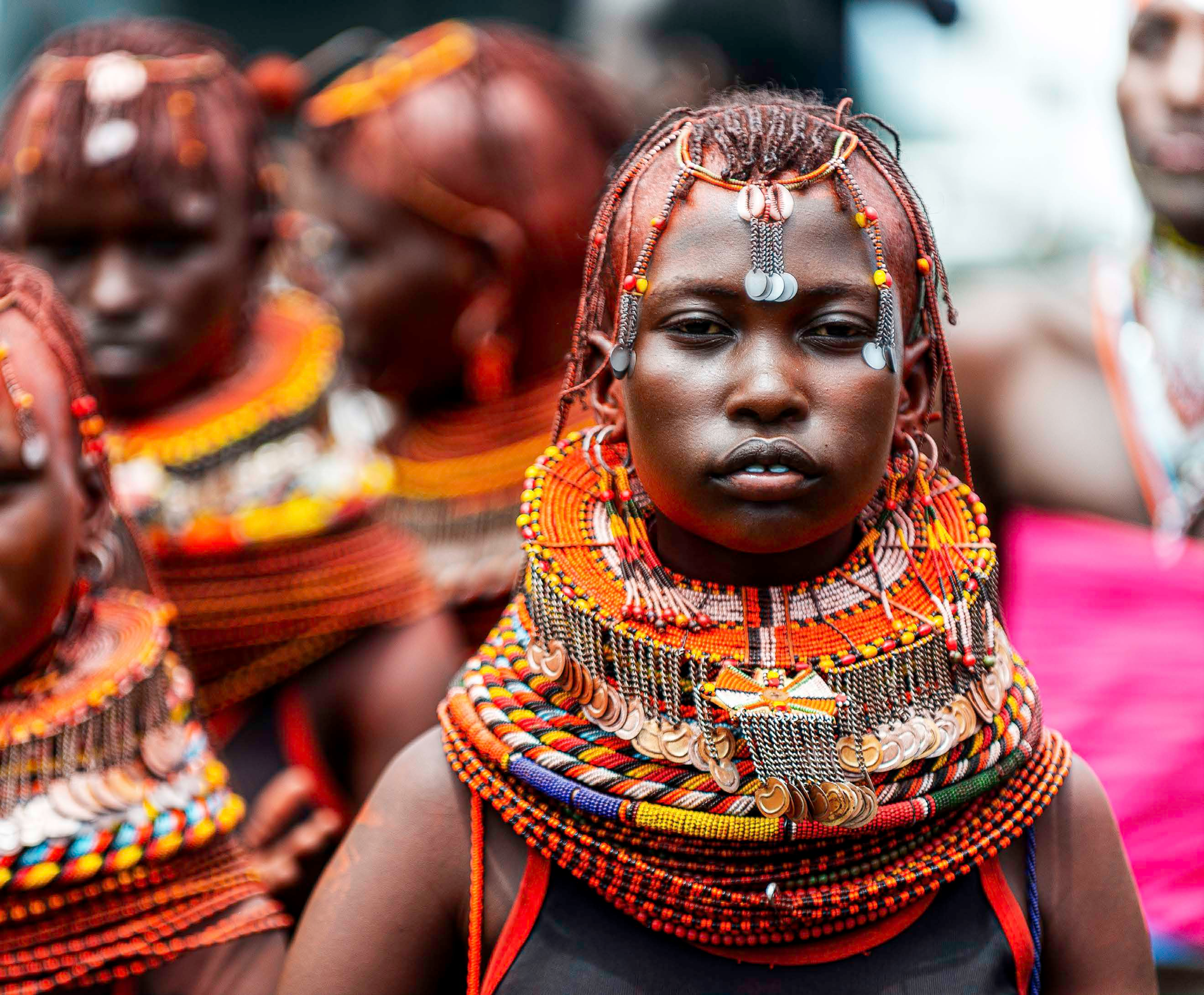 Close portrait of a woman wearing traditional beaded jewellery