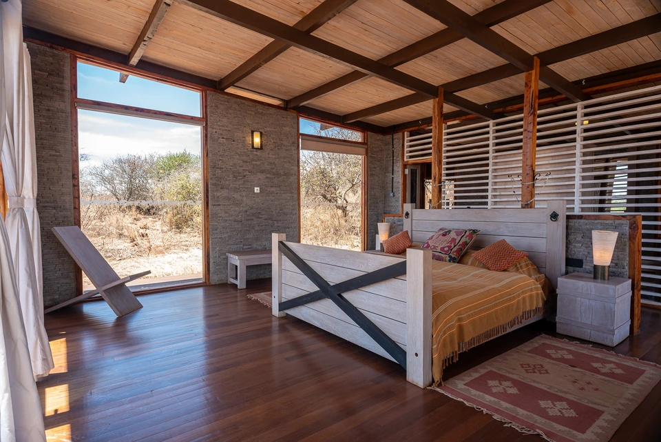 Bedroom with a timber ceiling and expansive views