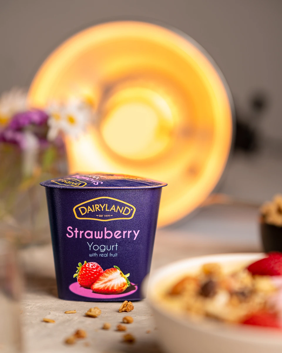 Product photograph of a dessert cup with a golden lid