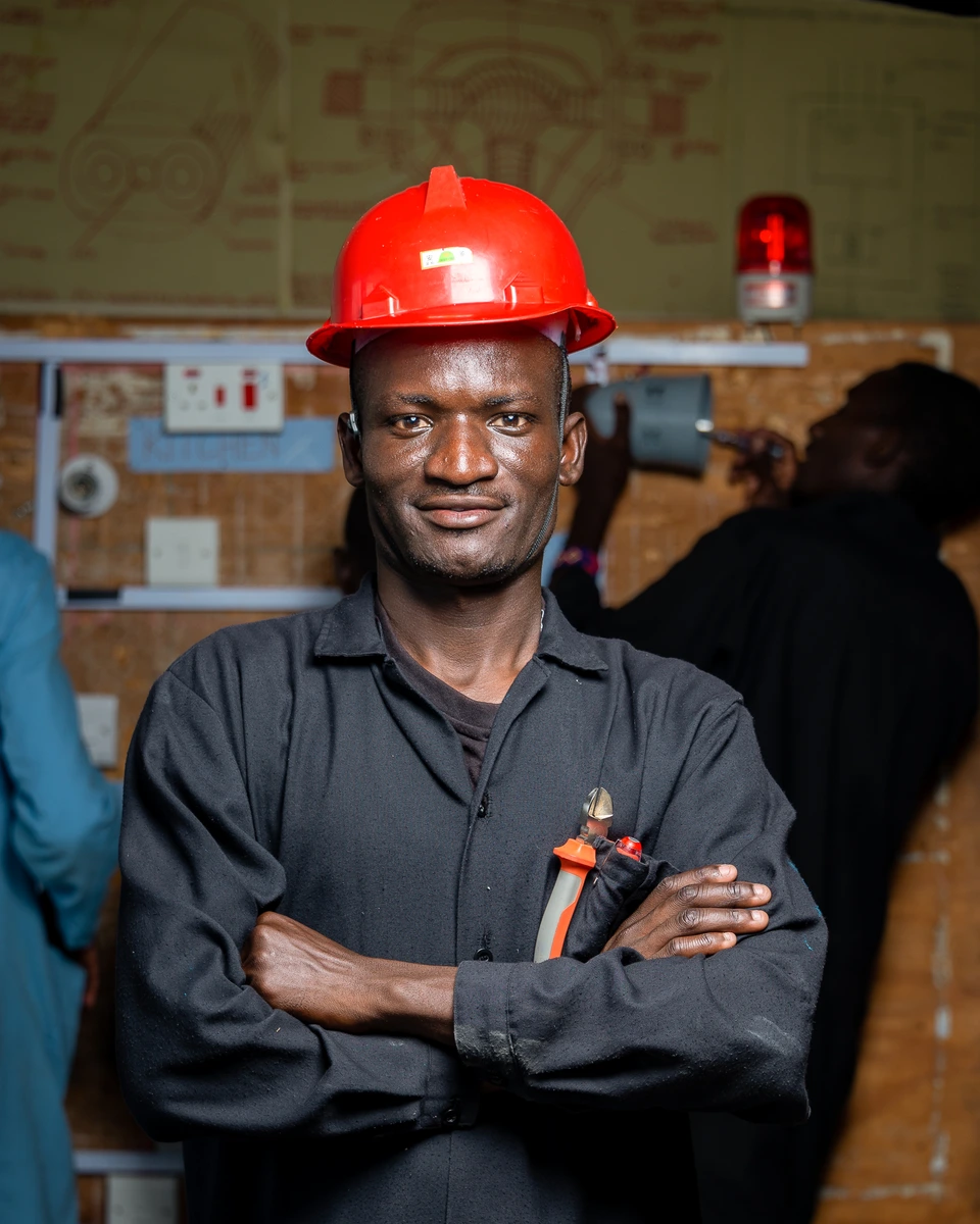 Industrial worker wearing protective headgear