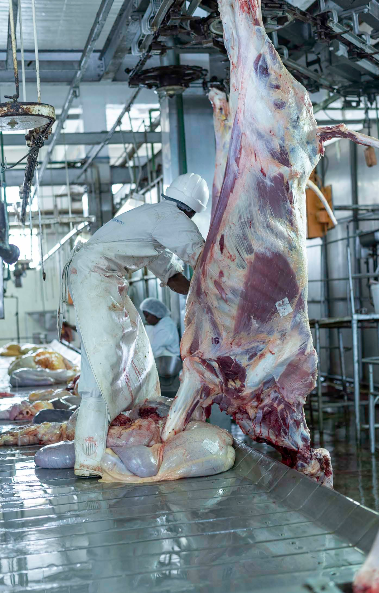 People working on an industrial production floor