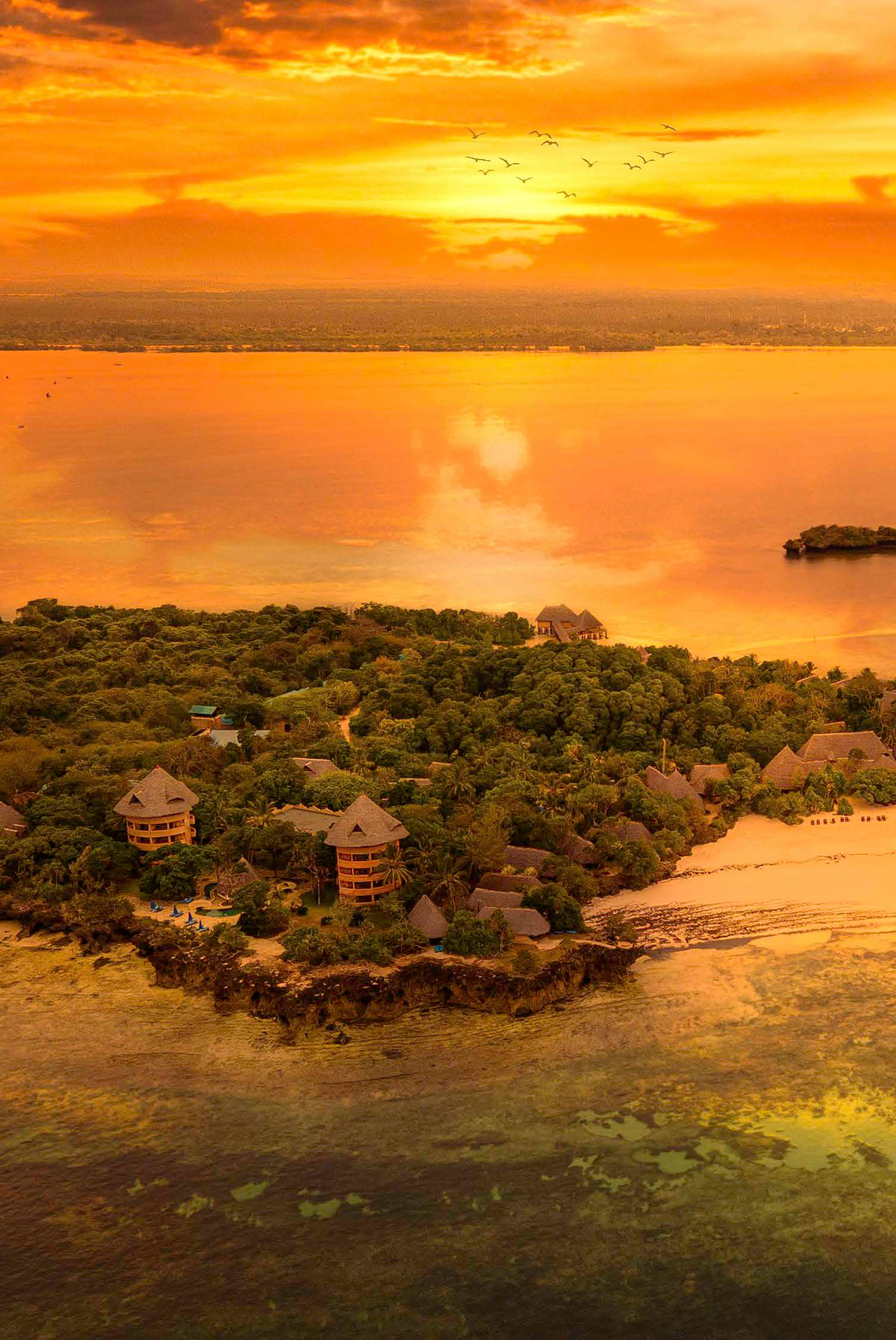 Golden sunset reflected in water and the surrounding landscape