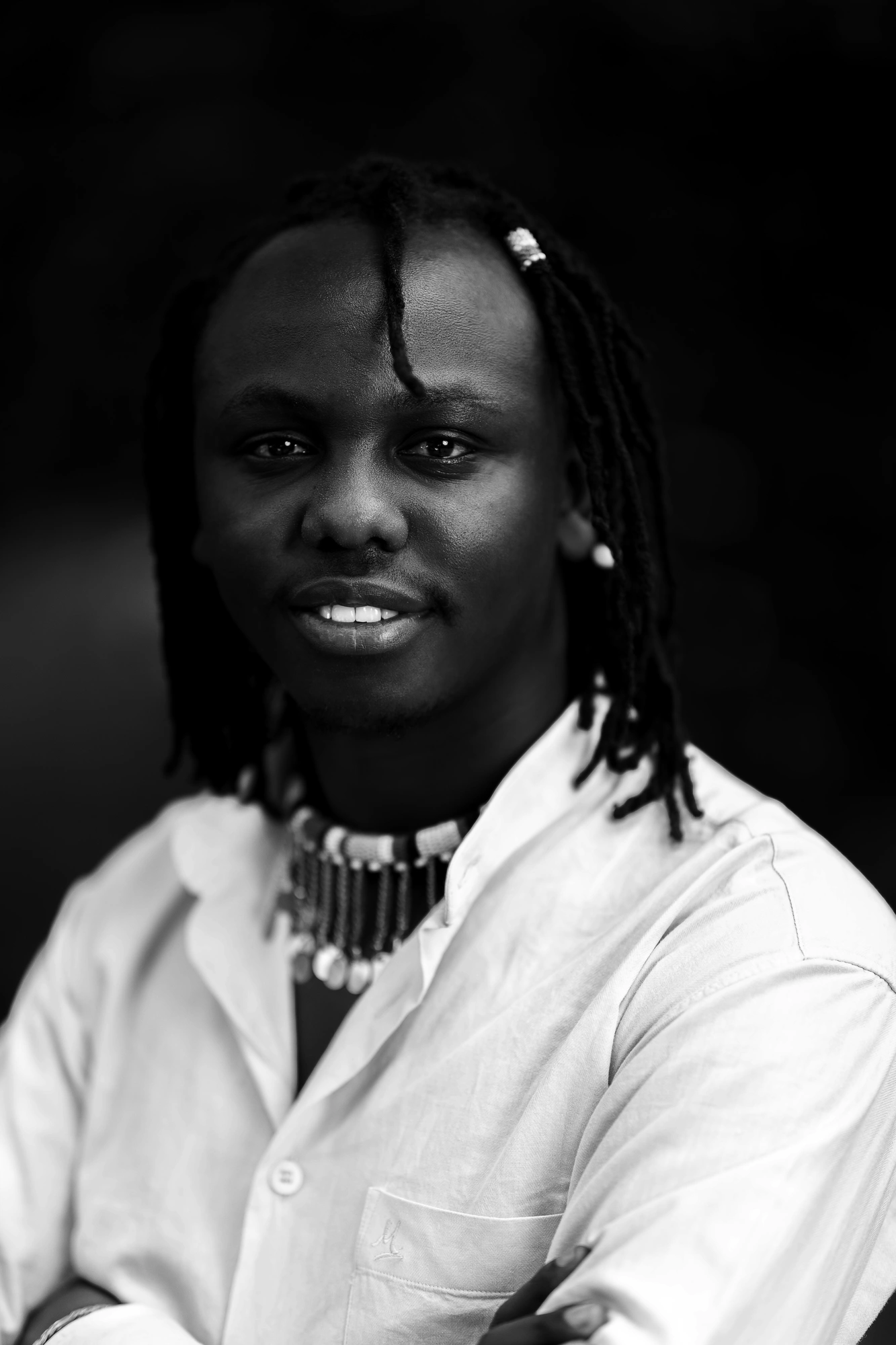 Black-and-white portrait of Paul Wambugu Kinyanjui